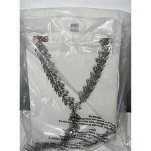silver-toned metal leaf long necklace from Zara